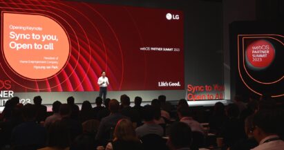 An LG presenter explaining LG's vision of ‘Sync to You, Open to All’ to partner companies