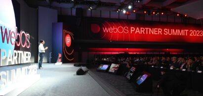A side view of the webOS Partner Summit event showing partner company representatives listening to the speaker’s presentation on LG’s webOS platform business
