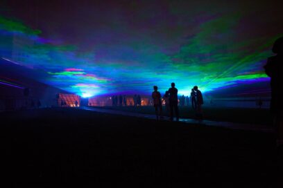 People admiring the artwork that brings the aurora borealis to Seoul Light DDP 2023