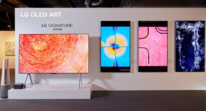 The LG SIGNATURE OLED M3 model displayed at the Hong Kong Digital Art Fair with three LG Smart TVs to its right on the wall