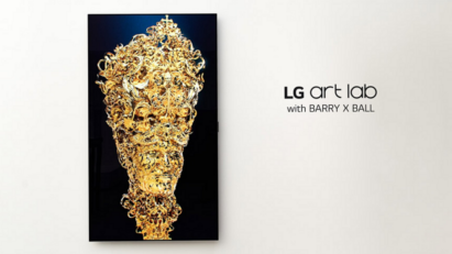 A wall-mounted LG OLED TV has been rotated 90 degrees to display an NFT sculpture created by LG Art Lab with Barry X Ball