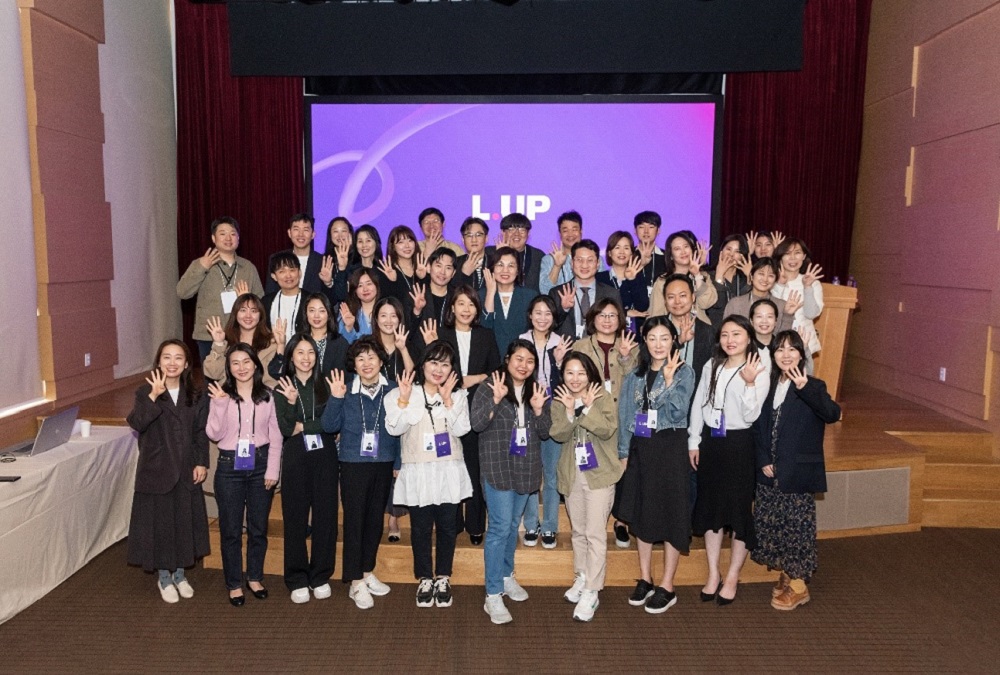 L.UP members posing together for a picture