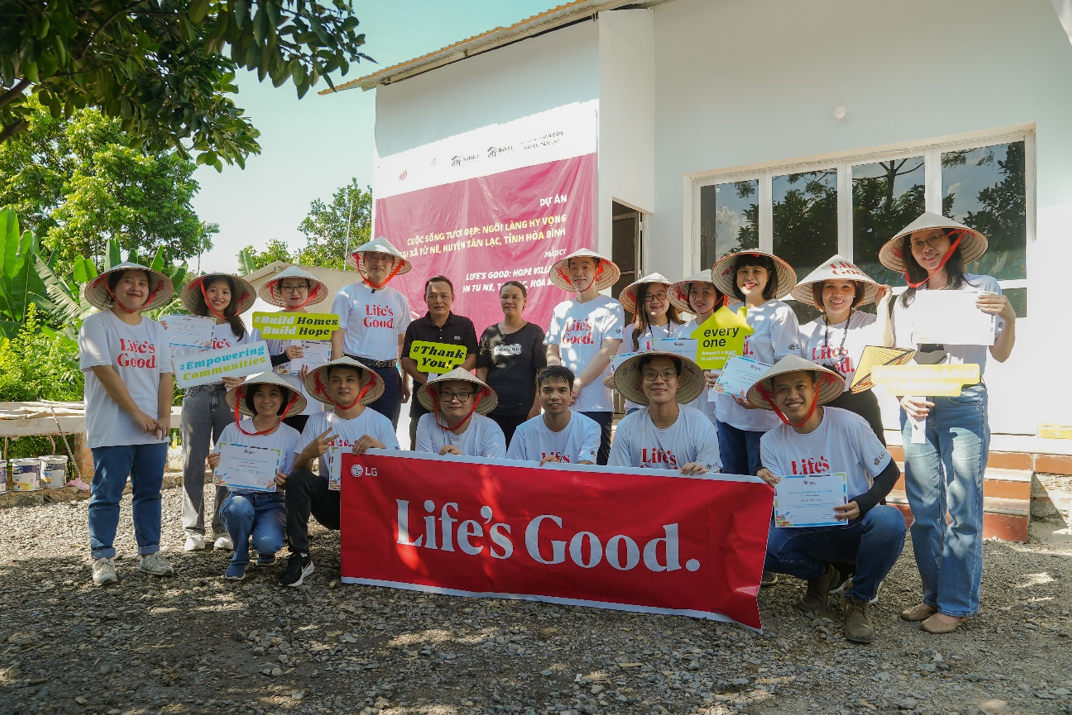 LG employees posing together for a photo to celebrate Life's Good Volunteer Day activity