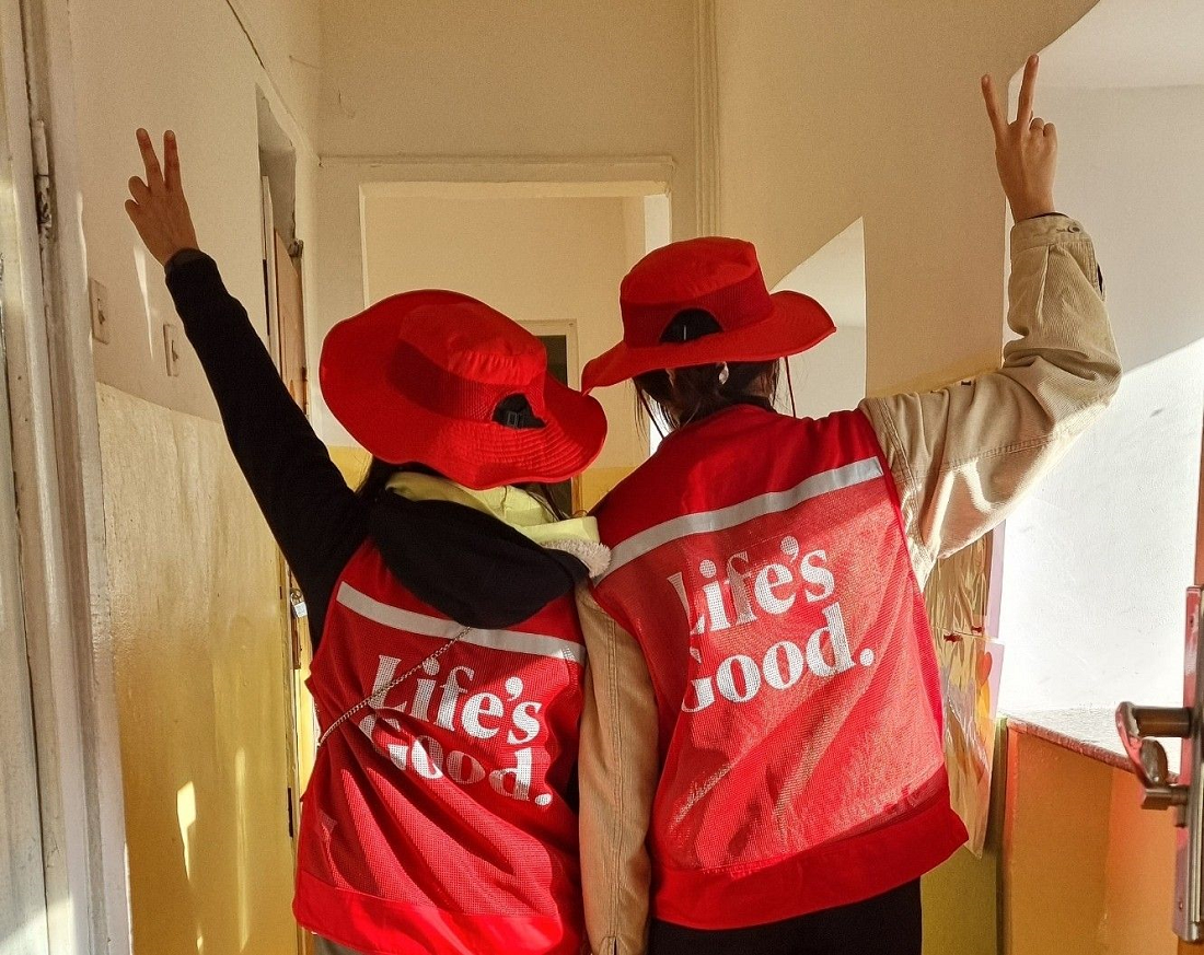 Two Life's Good volunteers posing together for a photo