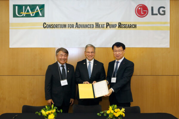 At the ceremony for the consortium for advanced heat pump research in Alaska, Thomas Yoon (CEO of LG Electronics North America), Sean Parnell (chancellor of the University of Alaska Anchorage), and James Lee (head of the Air Solution Business Unit at LG Electronics) are standing next to each other from left to right