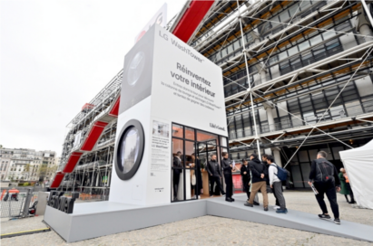 People lined up to go inside of LG WashTower structure at Pompidou Center