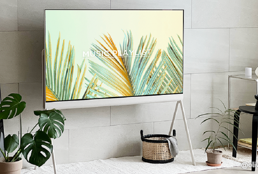 A photo, with white spaces on the top and bottom, of the LG Objet Collection Pose TV placed next to the living room wall