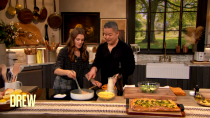 A photo of Drew Barrymore and Danny cooking together