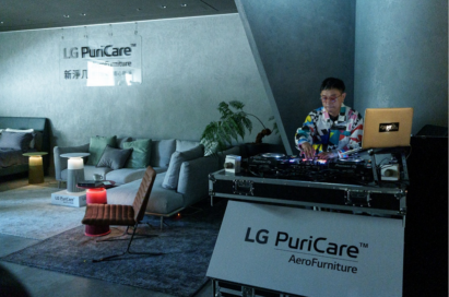 A photo of the LG PuriCare AeroFurniture event and the DJ playing music