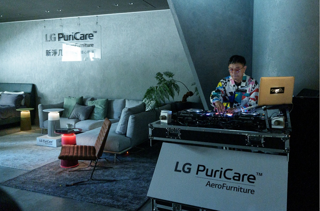 A photo of the LG PuriCare AeroFurniture event and the DJ playing music
