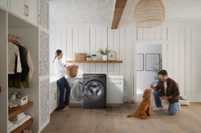 An image of a woman using the LG WashCombo and a man with a dog next to her