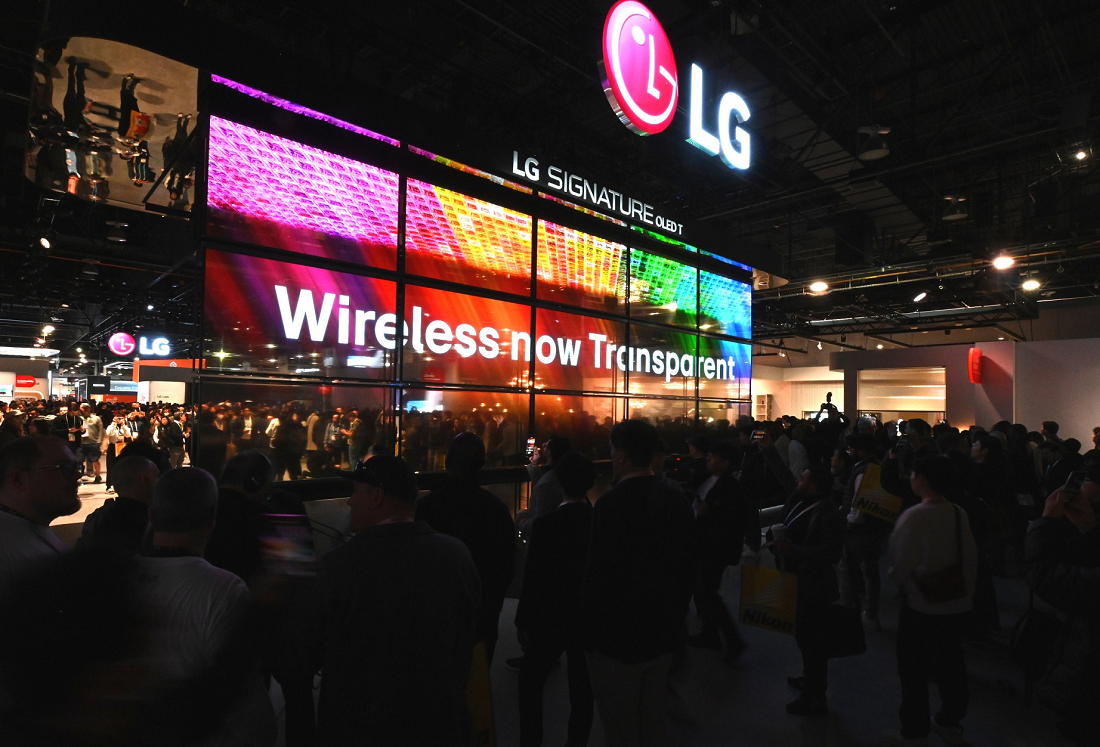 Photo of LG's booth at CES 2024 with the OLED T display