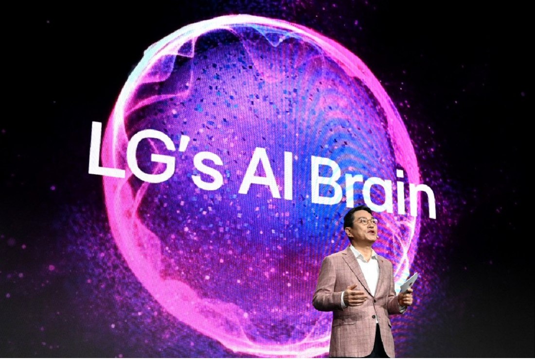 LG's CEO William Cho talking in front of a big display that has the words 'LG's AI Brain'