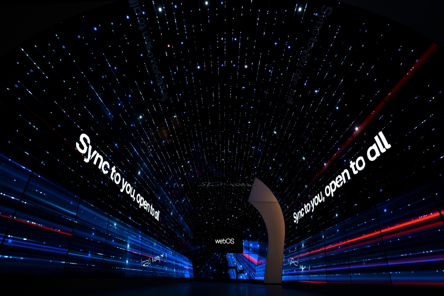 LG’s vision statement "Sync to you, open to all" appears on the OLED display of the LG webOS zone