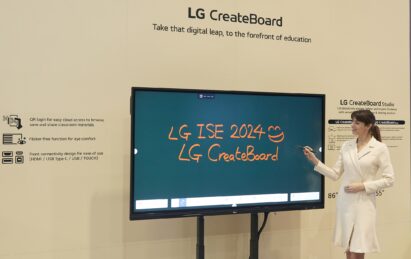 A woman shows a demonstration of LG CreateBoard