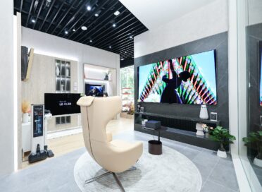 A photo of the zone with an LG OLED and a living-room like setting