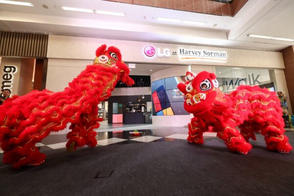 A photo of the LG at Harvey Norman site with red lion dancers
