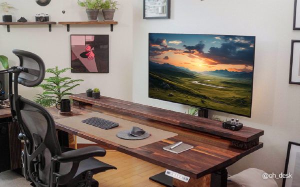 A picture of an LG OLED TV in a desk setting