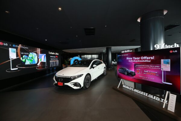 A picture of the ATTA Autohaus showroom with a white Mercedes Benz vehicle