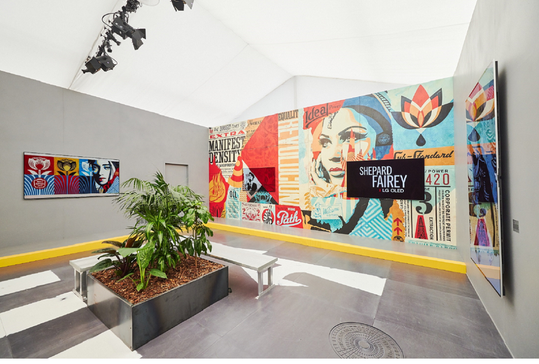 Two of LG OLED TVs are positioned above a mural, with the right displaying Shephard Fairey X LG OLED and the left displaying part of the mural