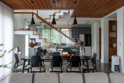 A picture of the dining table and the kitchen area of the LG Objet House