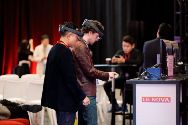A picture of people trying out products and technologies at the LG NOVA showcase