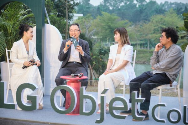A picture of four people talking about the LG Objet Collection