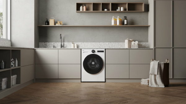 A picture of a kitchen with a washing machine built in