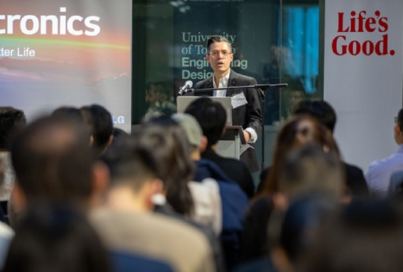 An image of senior director and head of the LG Toronto AI lab, Kevin Ferreira talking on the podium