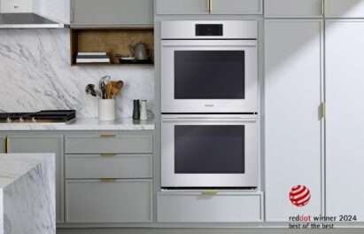 A picture of a kitchen with cabinets and microwave
