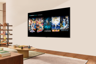 A wall-mounted LG Smart TV in a cozy living room displays a selection of anime content from Anime Onegai on LG Channels