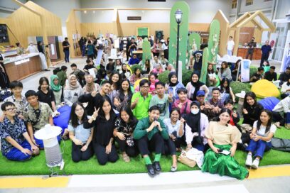 A group photo of people smiling and posing at the Better Life Festival