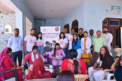 A group picture of people gathered around with LG employees and program-related people
