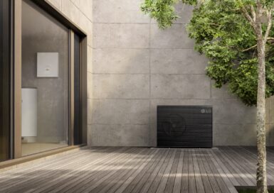 A photo of the LG Therma V™ R290 Monobloc 7 and 9 kilowatt(kW) air-to-water heat pump (AWHP) set up in a residential outdoor space