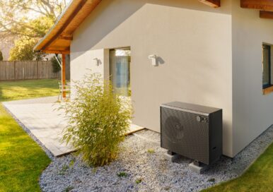 A photo of the LG Therma V™ R290 Monobloc 7 and 9 kilowatt(kW) air-to-water heat pump (AWHP) set up in a residential outdoor space