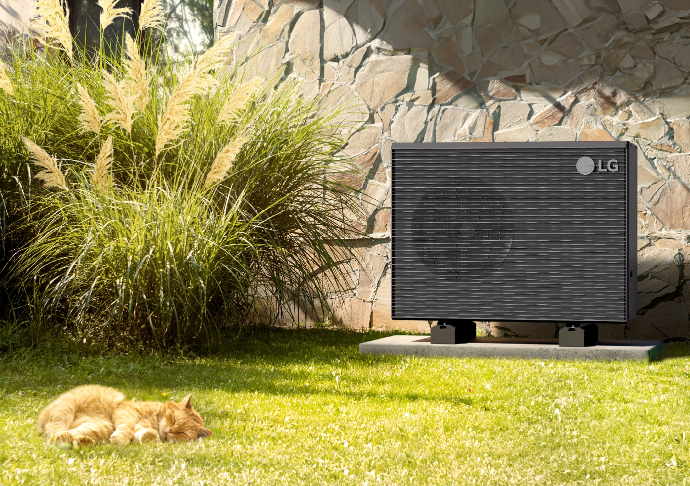 A photo of the LG Therma V™ R290 Monobloc 7 and 9 kilowatt(kW) air-to-water heat pump (AWHP) set up in a residential outdoor space