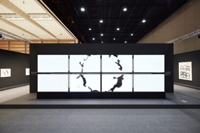 A picture of eight LG OLED screens displaying artwork