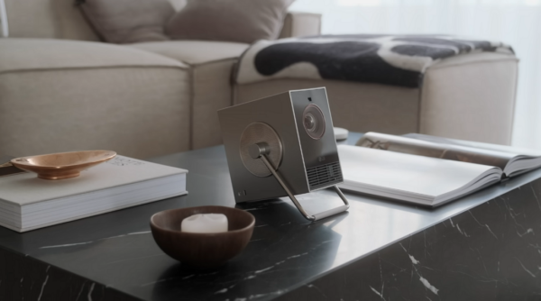 A photo of LG CineBeam Q projector with a 360-degree rotatable handle
