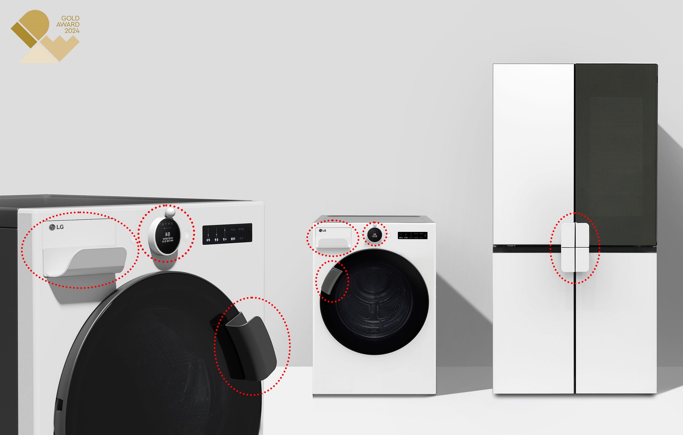 A closer image of a washer, dryer and refrigerator next to each other