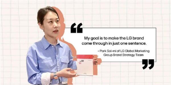 A picture of Park Sol-mi holding the LG Brand Book with her quote