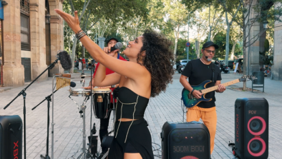 Performers deliver a musical presentation on the streets of Spain, supported by LG XBOOM speakers