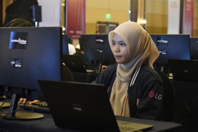 A picture of a woman working on the computer