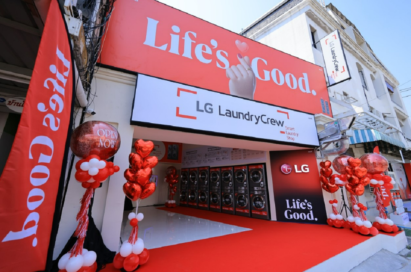 A photo of LG LaundryCrew event with a large Life's Good logo, filled with LG Laundry products inside