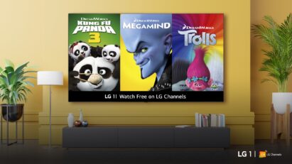 An LG smart TV mounted on a bright wall displays posters for Kung Fu Panda 3, Megamind and Trolls, advertising the free content available on LG Channels