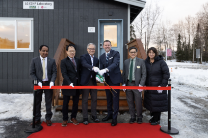 A photo of Professor Getu Hailu (Associate Professor of UAA), Sangok Kweon (Director of LG Electronics research and development), Sean Parnell (UAA Chancellor), Steve Scarbrough (Senior Vice President of LG Electronics USA), Kenrick Mock (Dean of the College of Engineering of UAA), and Suzanne Rigdon (Marketing head of LG Electronics USA) cutting the ribbon