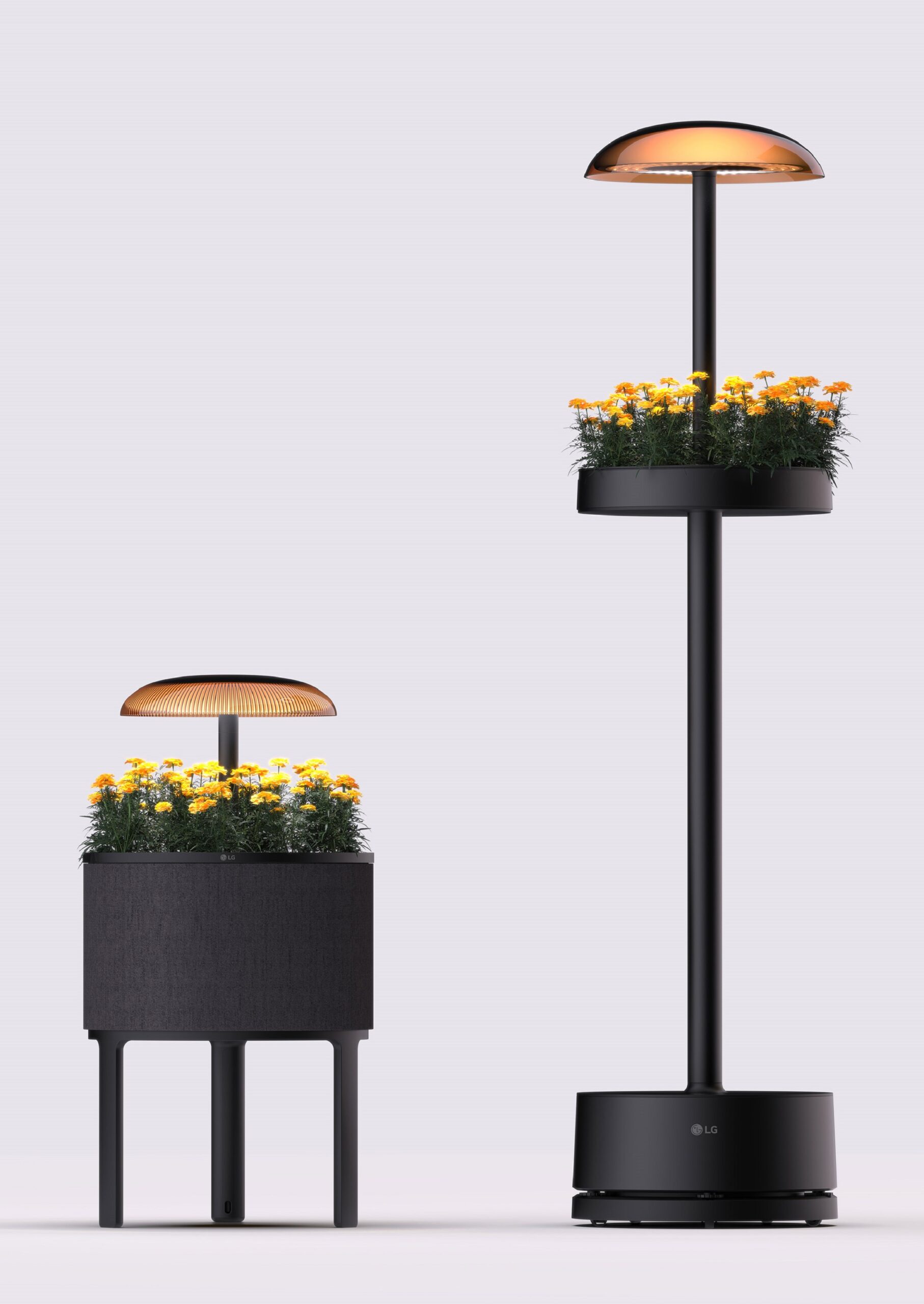A Photo of the new LG indoor gardening appliances featuring two versions of its modern floor-standing lamp design and a nature-inspired side table design
