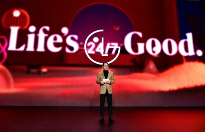 A picture of LG CEO William Cho speaking on stage with the Life's Good logo in the back
