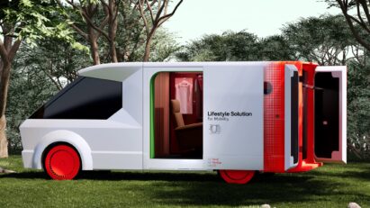 A photo of the LG Mobility Experience platform parked on a green landscape