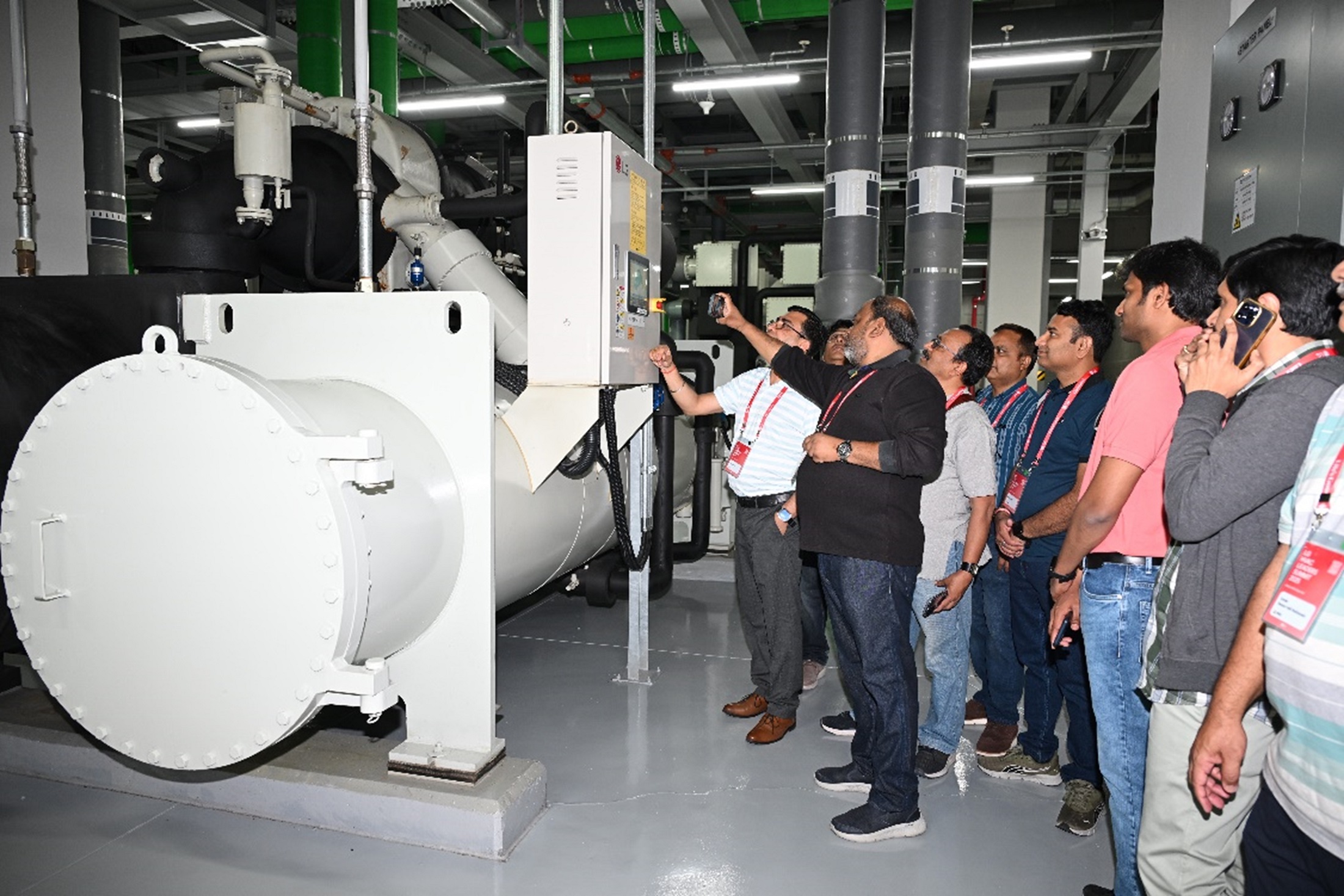 A photo of a crowd observing machinery